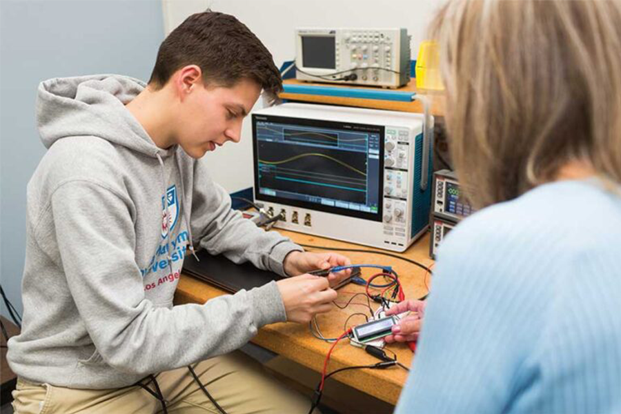 Barbara Marino helps LMU student